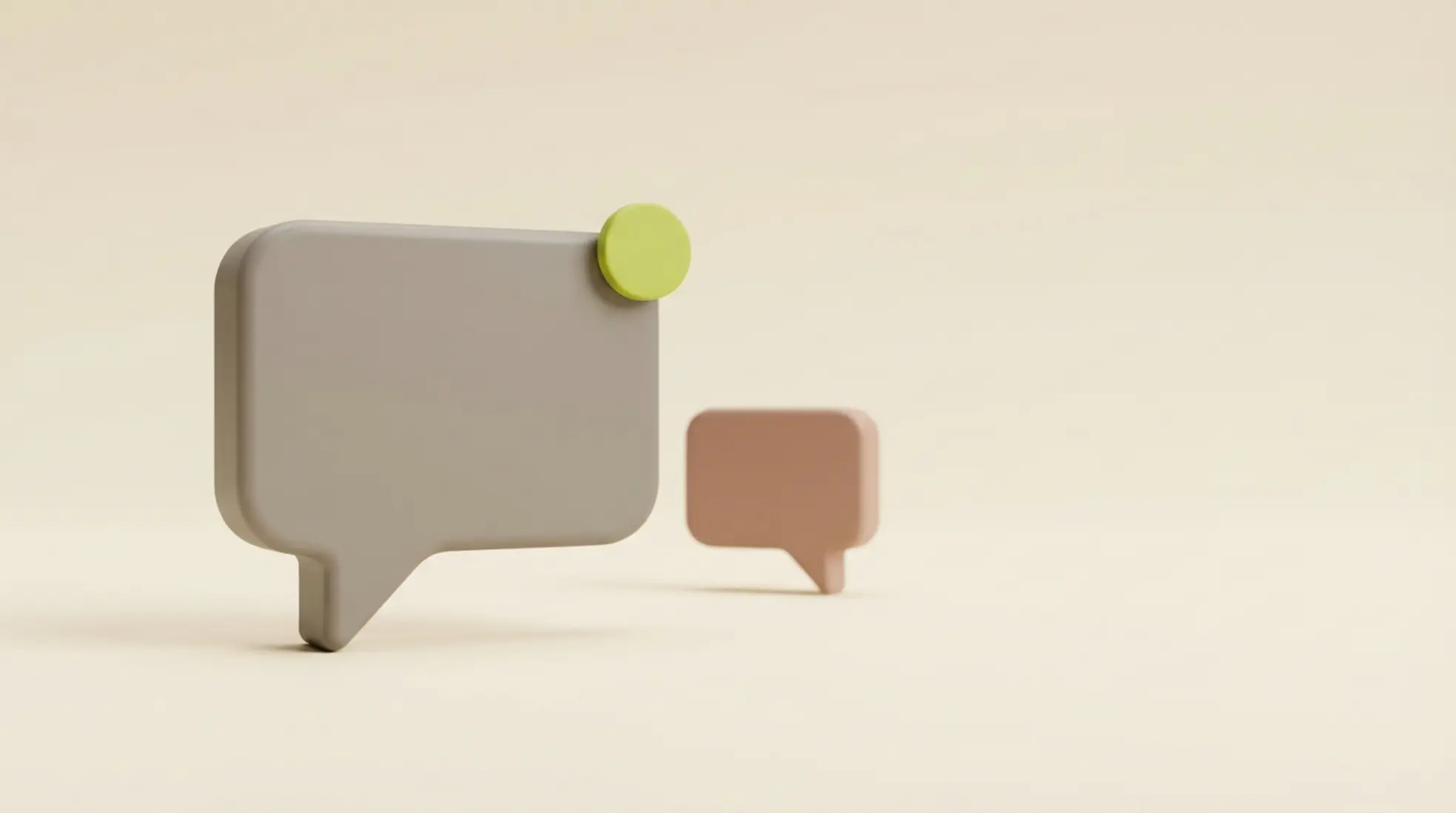 Driedimensionale grijze chatballon met groen meldpuntje voorop, tweede vage ballon erachter op rustige cremekleurige achtergrond met veel lege ruimte
